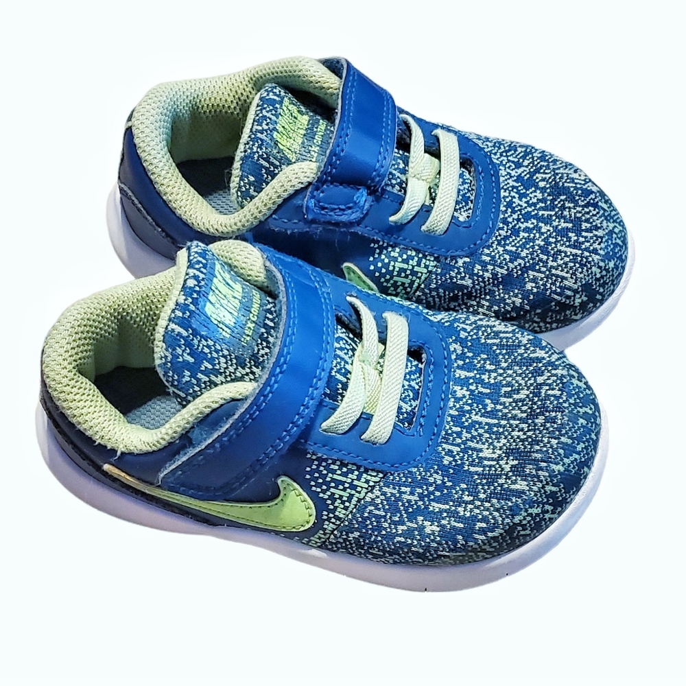 Little kids Nike sneakers. Blue and light green. Good pre owned condition.